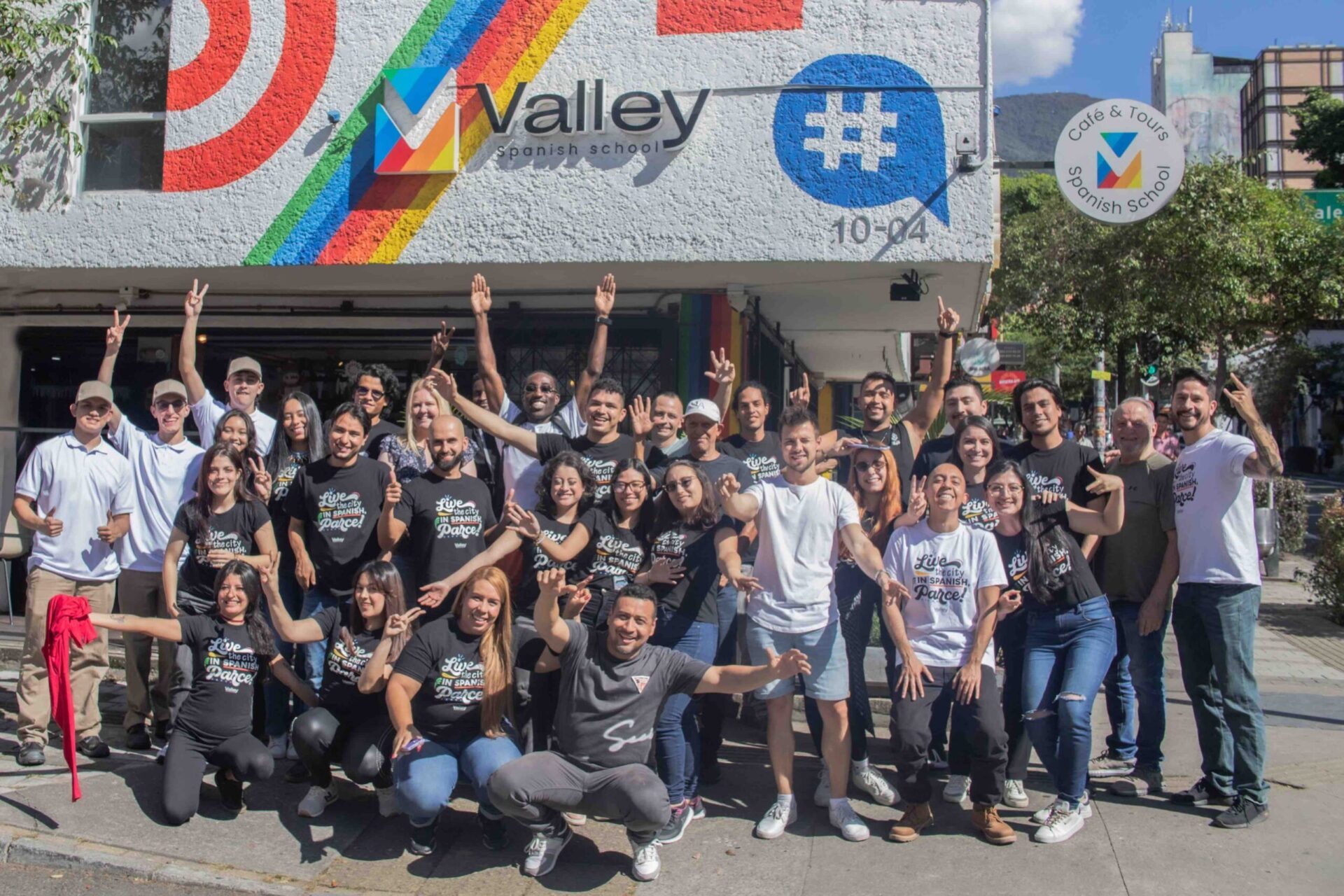 Students and teacher take a picture outside Valley Spanish School